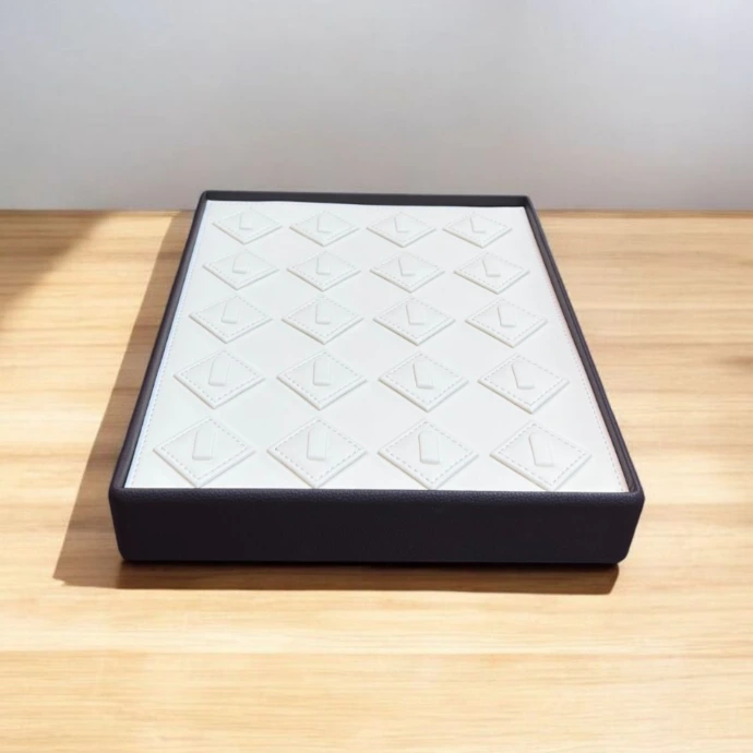 Premium MDF ring tray covered in brown rexine with white rexine ring holders, offering an elegant and professional jewellery display.