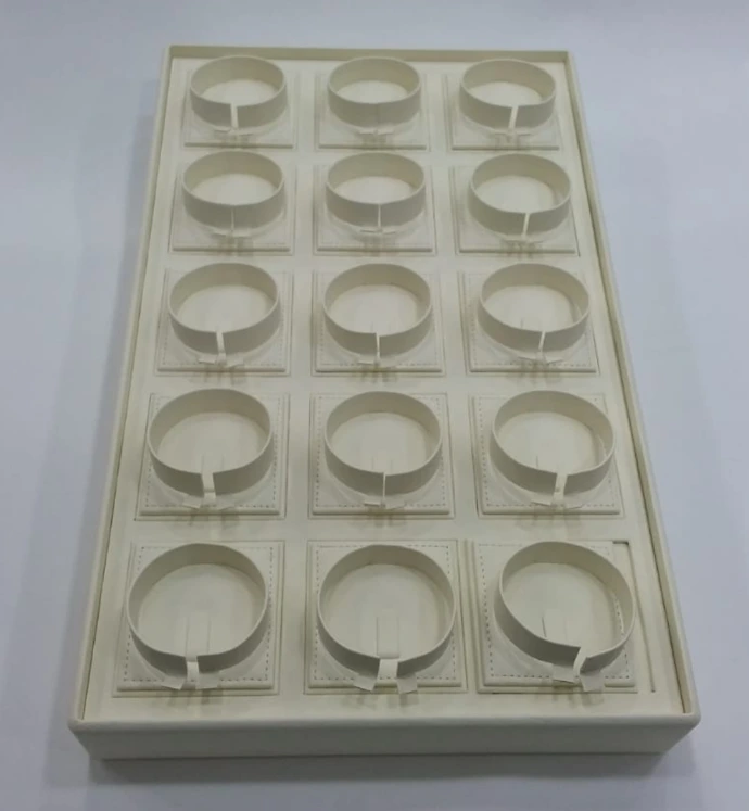 Elegant bangle tray finished in beige rexine, featuring a removable single bangle stand for a neat and versatile display