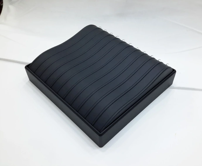 Stylish bracelet tray finished in black PU Leather, offering an elegant and organized display for bracelets.