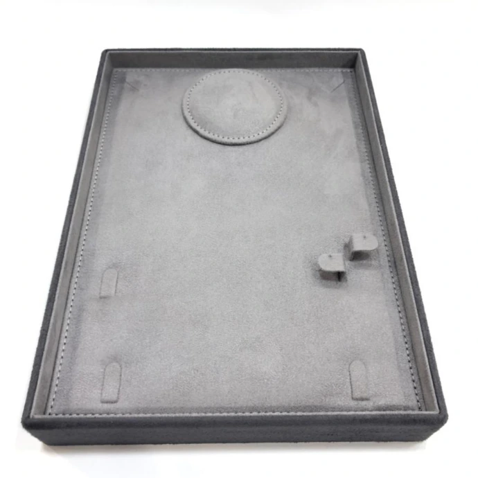 Gray suede necklace set display, crafted to showcase complete jewellery sets with a refined look.