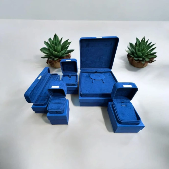 Premium ready-made jewellery boxes imported from China, crafted with a luxurious blue suede interior and exterior for a rich and elegant finish. Perfect for stylish jewellery storage, display, and gifting.